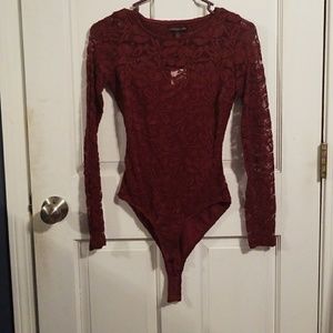 Made in lace open back bodysuit